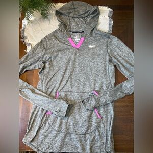 Woman’s size medium grey Nike long sleeve with hood